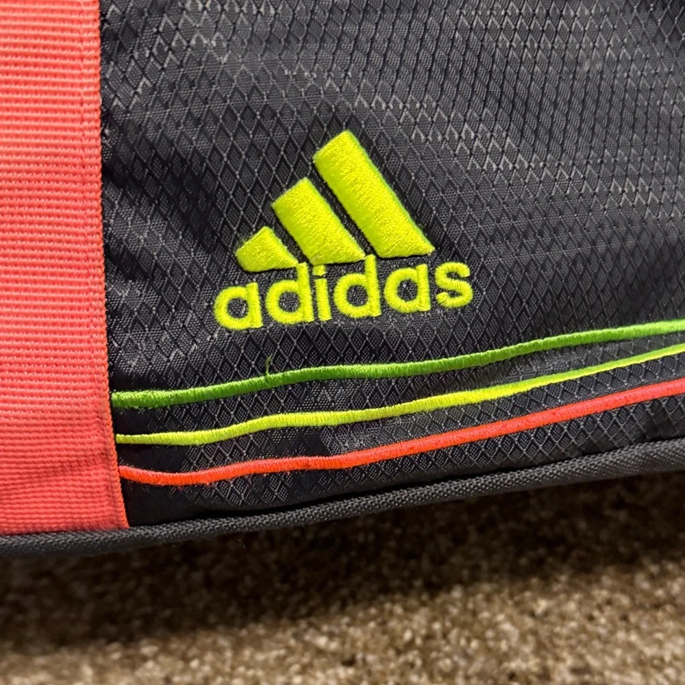 adidas Black Duffel with Coral Straps and Neon Yellow Accents